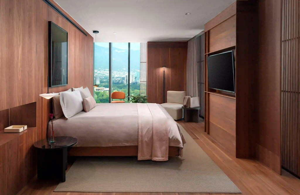 Habitación de lujo en Monterrey con decoración elegante y vista a las montañas
